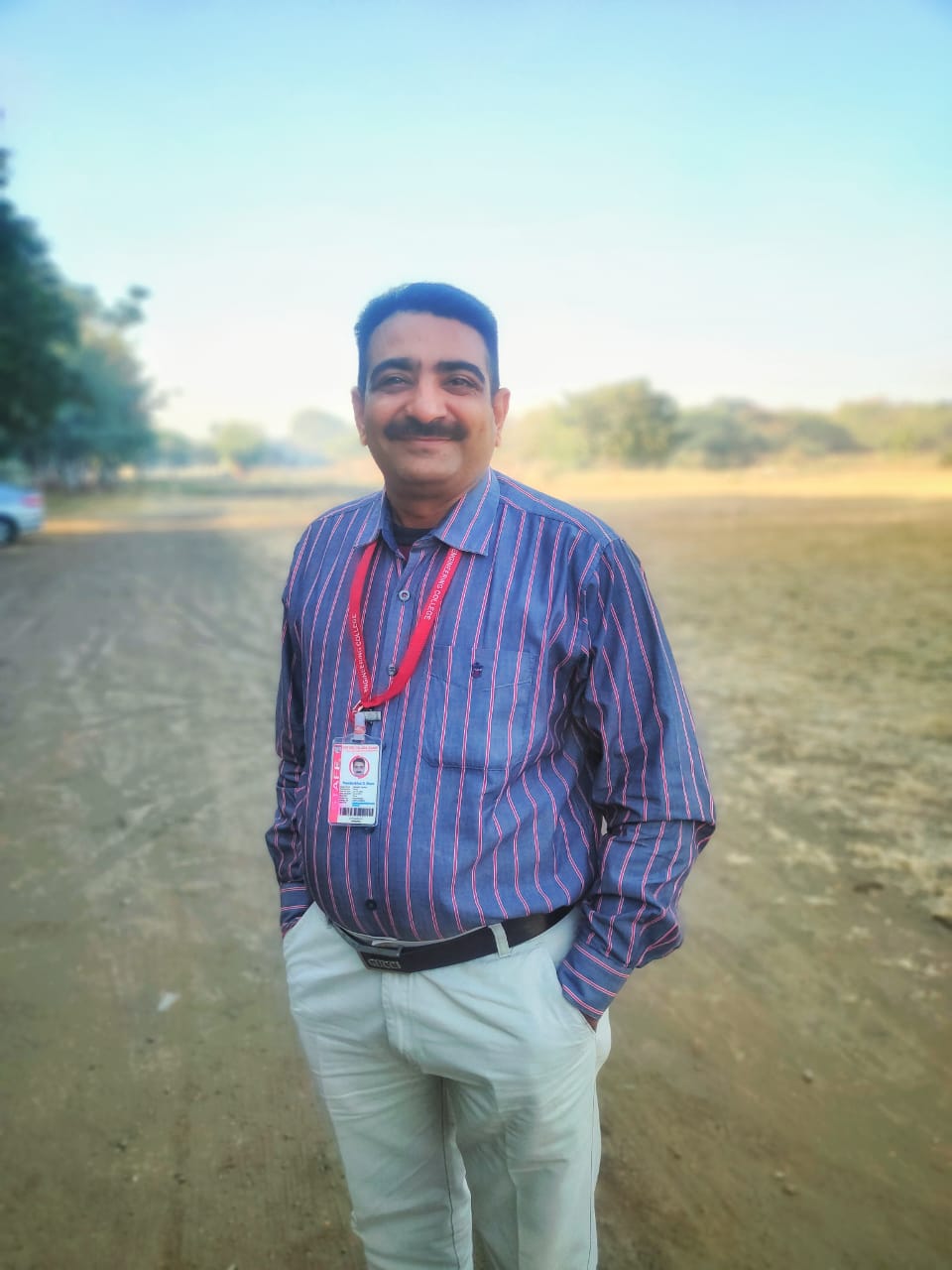 Mr. NandanBhai Dave